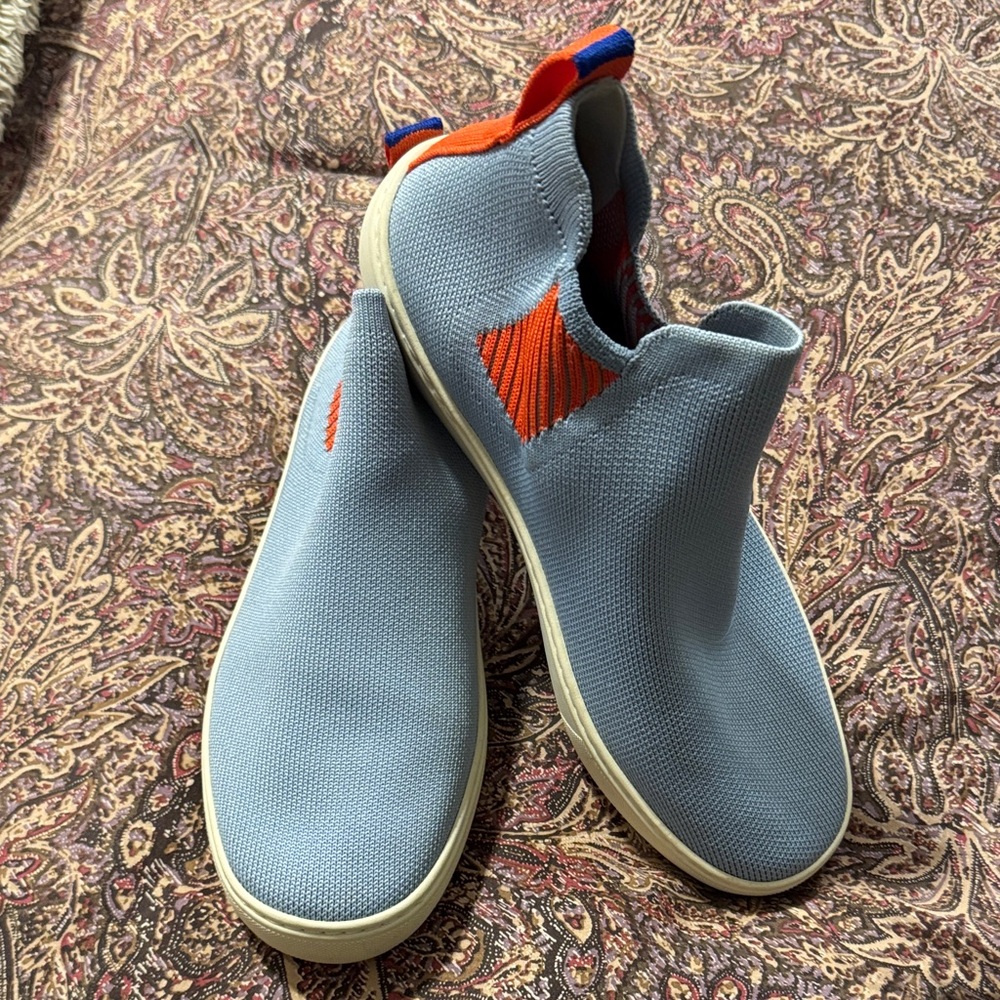 Rothy's Stylish Blue Slip-On Sneakers with Red Accents
